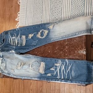 ladies 32 worn out jeans . no brand name inside.  (internet buy)